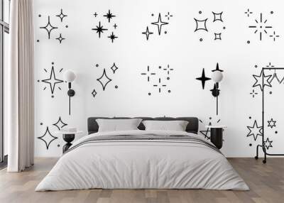 Stars and sparkles doodle set. Twinkle, blink, firework, glitter silhouette and glowing symbols in sketch style. Hand drawn vector illustration isolated on white background Wall mural