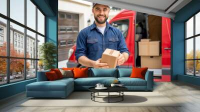 A delivery man delivering a package. Delivery courier service.  Wall mural