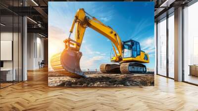 Excavator on a construction site under a blue sky Wall mural