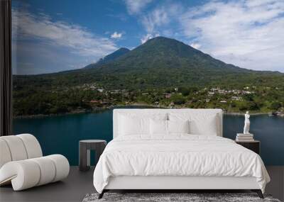 beautiful wide drone capture of lake atitlan in guatemala with a mountain in the background Wall mural