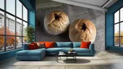 Two pieces of bread are placed on the sack. Wall mural