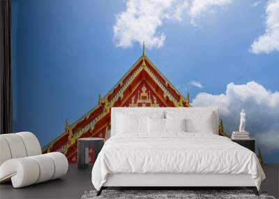 Temple roof with blue sky in Thailand Wall mural