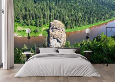 The picturesque Devil's Finger rock overlooking the Usva River. Massif Usvinskie Pillars. Perm Territory. Russia Wall mural