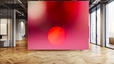 Abstract blurred background, red spot on pink gradient background. Wall mural