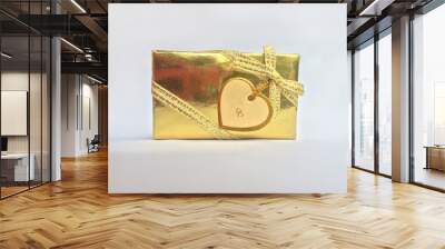 Gold gift box with heart label card. Mobile photography Wall mural