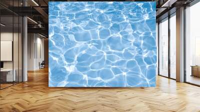 Blue water surface with bright sun light reflections, water in swimming pool background Wall mural