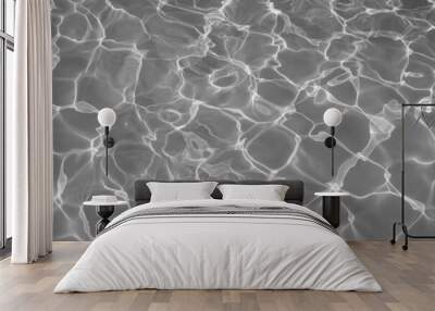 Gray water surface with bright sun light reflections, Black and white water in swimming pool background Wall mural