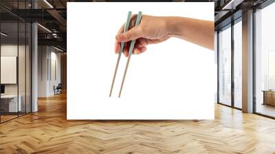 Hand holding chopsticks isolated on a transparent background Wall mural