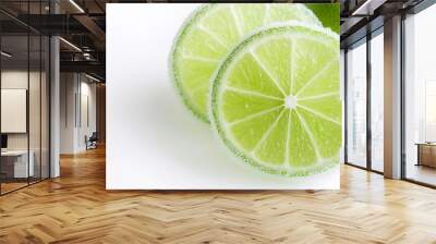 Juicy sliced lime isolated on white background, Close up shot lime. Wall mural