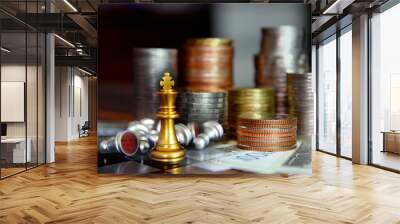 golden chess on board with coins stacking on bank note , business concept Wall mural