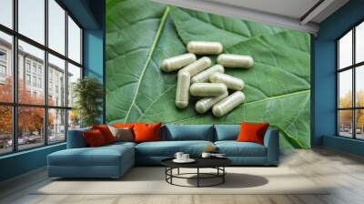 Herbal supplement medicine on herb leaf for healthy eating  Wall mural