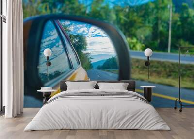 highway road reflection on car side mirror use for car driving insurance concept  Wall mural