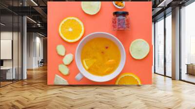 Yellow healthy drink with orange and cranberry. Health food and drink to boost immune system Wall mural