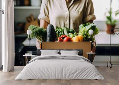 Nutritious Vegetable Delivery: Woman Receives Box of Fresh Groceries Wall mural