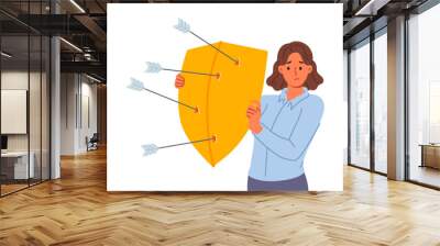 Upset woman defends from arrows of enemies, covering with shield to avoid injury. Girl defends and demonstrates defense mechanism that allows to escape from risk to life of elemental disorder Wall mural