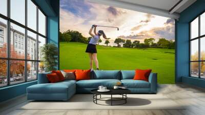 Professional woman golfer teeing golf in golf tournament competition at golf course for winner.	 Wall mural