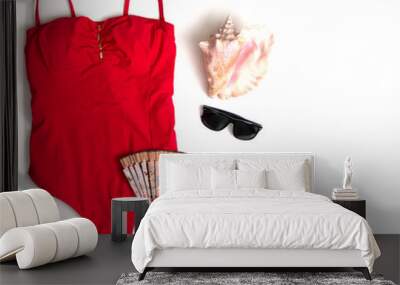 Red Swimming Suit on White Background with Glasses and Sea Shell. Wall mural