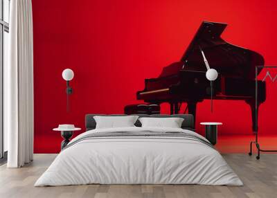 A sleek black grand piano positioned against a dramatic red backdrop, its keys poised for virtuosic performances that evoke passion and intensity with every note. Wall mural