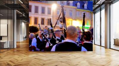 Concert de binious sur la place de Tréguier en Bretagne Wall mural