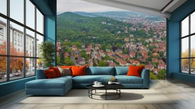 Drone panorama of thuringian city Eisenach with Wartburg castle during daytime Wall mural