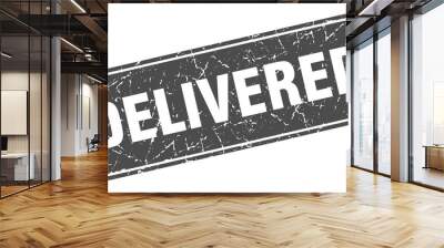 delivered sign. delivered grunge black stamp. Label Wall mural