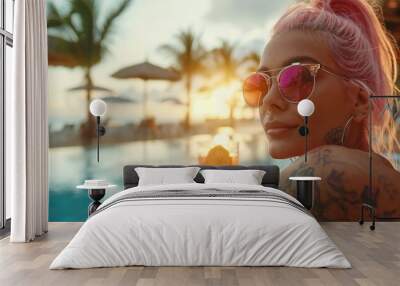 Happy teenager on summer vacation in a luxury resort. Summer holidays concept.. Portrait of a beautiful teenage tattooed influencer with pink hair and piercings having fun at a luxury resort Wall mural