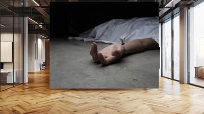 The dead woman's body. Focus on hand Wall mural