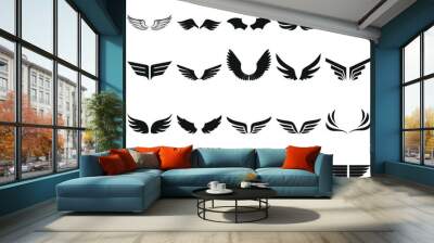 Black wings silhouette vector set, the wings set is ideal for logo, emblem, badge design. Versatile for art, heraldry, animal symbolism. Ranging from simple to intricate feather or scale details Wall mural