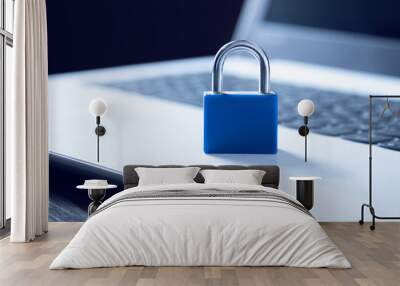 blue lock on the laptop on the desk Wall mural