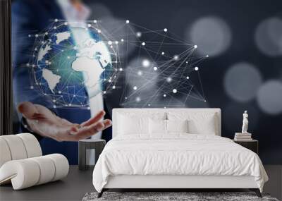 Businessman holding global network Wall mural