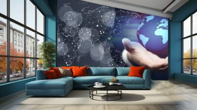 Businessman holding global network Wall mural