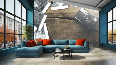 camera and photos on wood table Wall mural