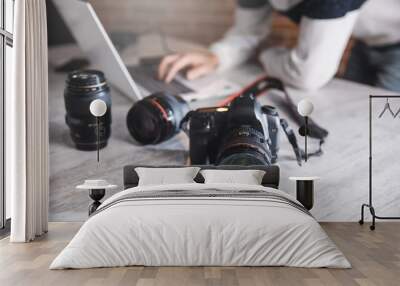 photographer man with camera on desk Wall mural