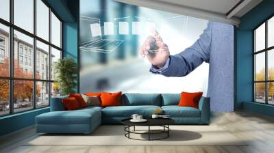 Transfer files from laptop to laptop. Man tapping on the screen Wall mural