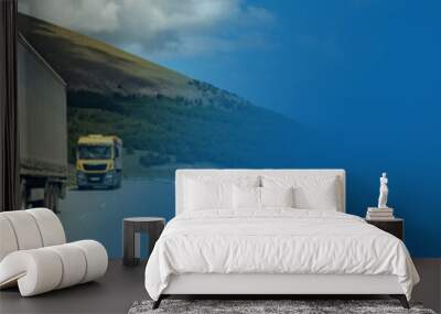 white and yellow trucks on highway Wall mural