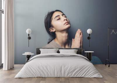 Woman hands praying to god Wall mural