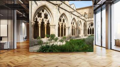 Horizontal view of the Gothic arches from the cloister garden of the Cistercian Monastery of Poblet, Tarragona, Spain, September 24, 2020 Wall mural