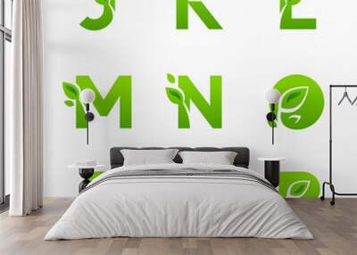 Set of green eco letters with leaves, font from J to R. Wall mural