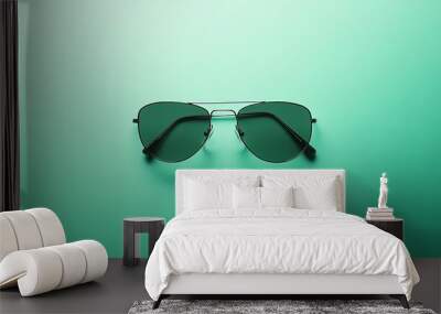 Black Aviator Sunglasses on a Mint Green Background Wall mural