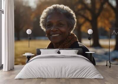 elderly black african lady woman on morning sunlight winter park background smiling happy looking at camera with copy space for banner backdrop from Generative AI Wall mural