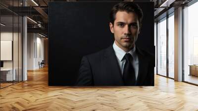 handsome lawyer looking at camera serious on dark plain black background from Generative AI Wall mural