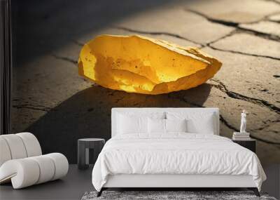 Soft yellow light on rough concrete surface background Wall mural