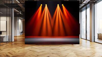 Three spotlights illuminate a stage with their bright orange light. Wall mural