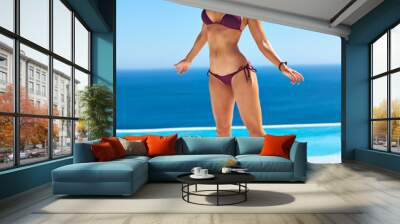 Beach, travel and bikini with woman, vacation and getaway trip with nature, water and Zanzibar. Person, outdoor and seaside with girl, ocean and swimwear and summer holiday with weekend break or joy Wall mural