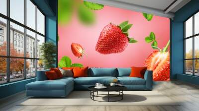 strawberry pieces flying on red background. Reference for design. Wall mural