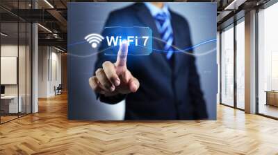 Businessman pointing on wi fi version 7 is new wireless internet technology Wall mural