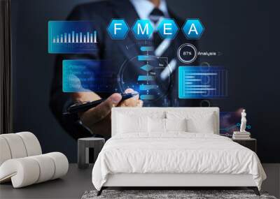 Businessman working with FMEA or failure mode and effect analysis to analyze cause of problem and find way to reduce and improve work process to better, raising production levels and reducing waste Wall mural