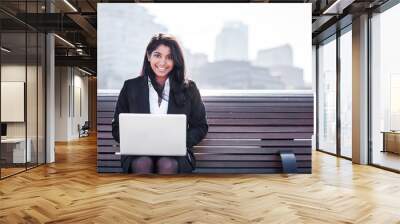 Indian businesswoman with laptop Wall mural