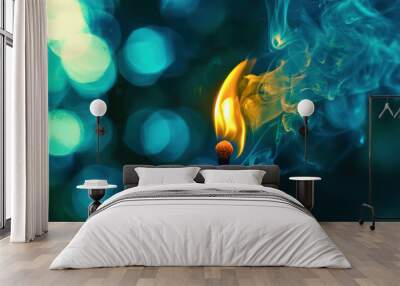 A match is lit and the flame is yellow Wall mural