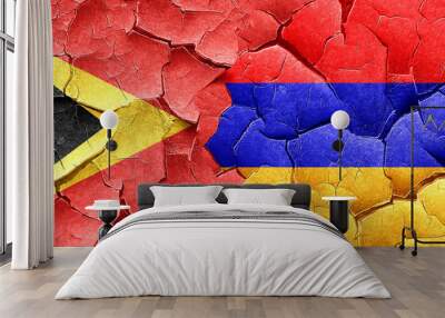 east timor flag with Armenia flag on a grunge cracked wall Wall mural